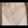 Bow Pendant Necklace with a Heart