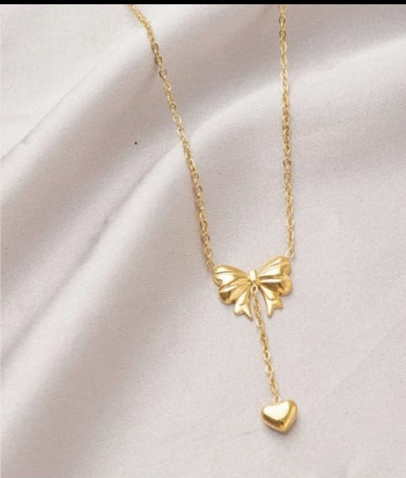 Bow Pendant Necklace with a Heart
