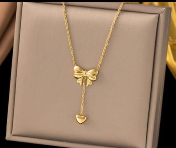 Bow Pendant Necklace with a Heart