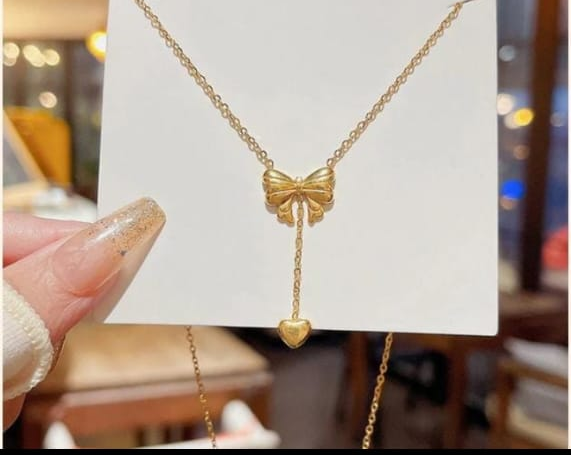 Bow Pendant Necklace with a Heart