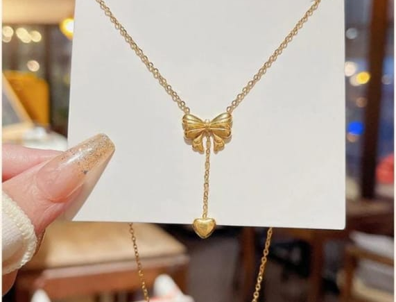 Bow Pendant Necklace with a Heart
