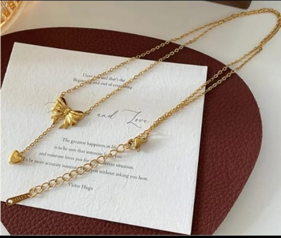 Bow Pendant Necklace with a Heart