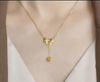 Bow Pendant Necklace with a Heart