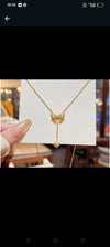 Bow Pendant Necklace with a Heart